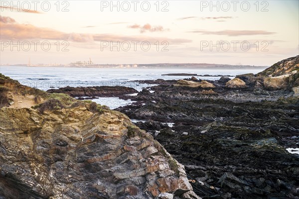 Beautiful landscape and seascape with rock formation in Samoqueira Beach