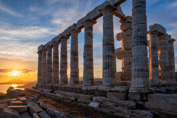 Cape Sounio sunset at Sounion with ruins of the iconic Poseidon temple