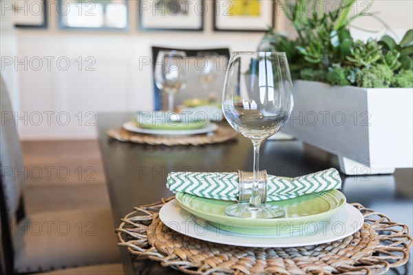 Abstract of dining table with place settings