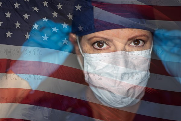 Doctor or nurse wearing medical face mask and scrubs with ghosted american flag