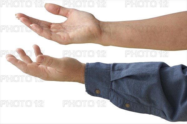 Male and female hands with palm out isolated on a white background