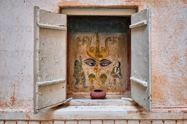 Mural with trident of the Hindu god Shiva small shrine in the Mehrangarh Fort