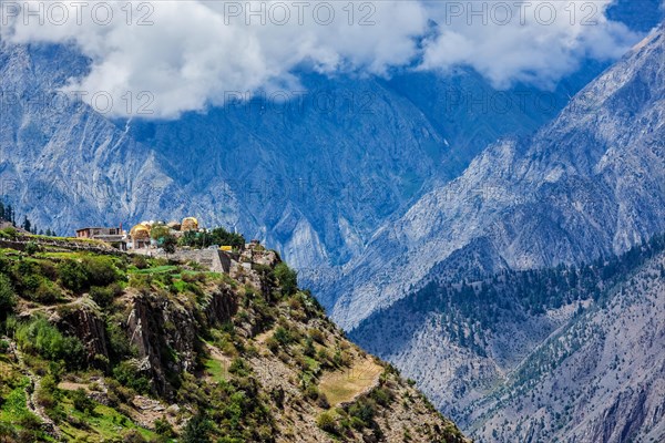 Triloknath village in Himalayas famous for Triloknath Temple with clouds. Lahaul valley