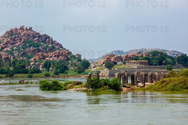 Ancient Vijayanagara Empire civilization ruins in Hampi near Tungabhadra river