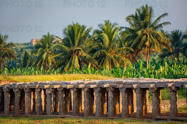 Ancient ruins of Hampi on sunset. Hampi