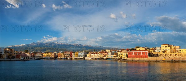 Panorama of picturesque old port of Chania is one of landmarks and tourist destinations of Crete island in the morning on sunrise. Chania