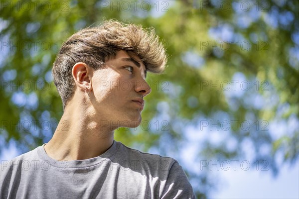 Confident young blonde man portrait