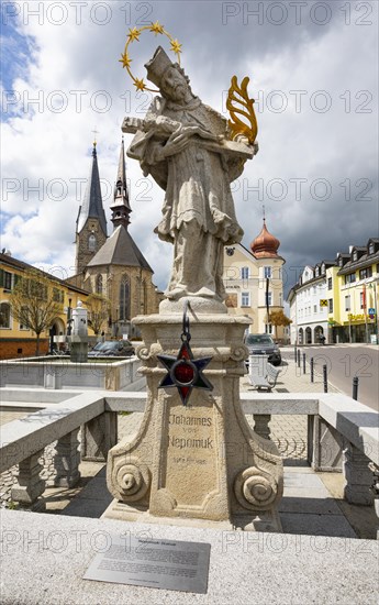 Nepomuk statue on the main square with town parish church