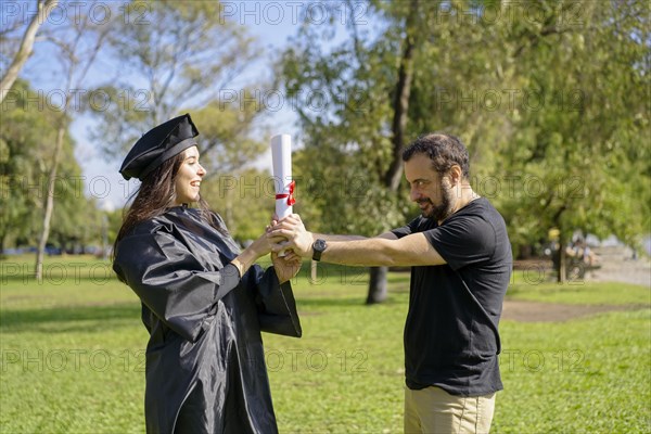 Young girl recently graduated