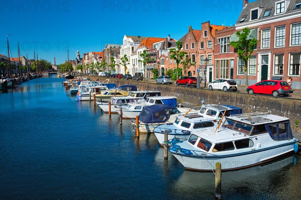 View of the harbour with moored boats in Delfshaven district. Rotterdam