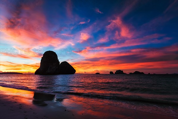 Tropical holidays sunset beach. Pranang beach. Railay