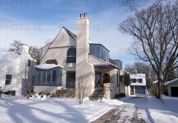 Majestic newly constructed home facade on a blustery day