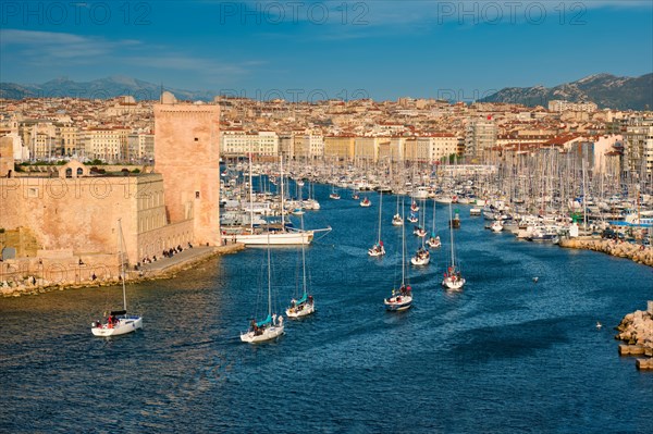 Yachts coming from boat regatta to Marseille Old Port