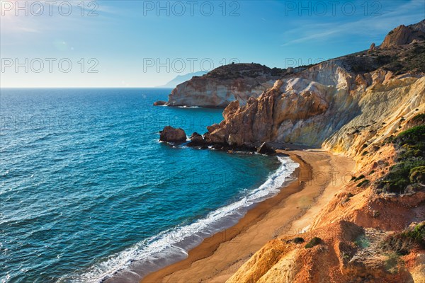 Agios Ioannis greek beach and Aegean sea on sunset