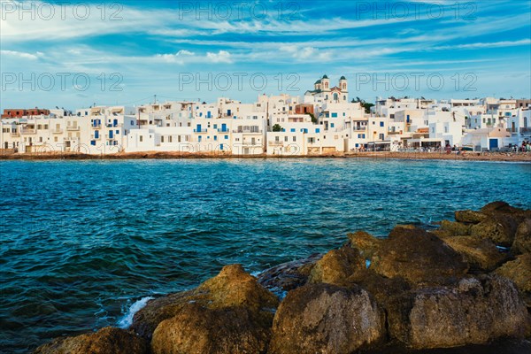 Picturesque view of Naousa town with greek orthodox church in famous tourist attraction Paros island