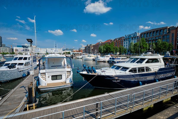 Yachts and boats moored in Willemdock in Antwerp. View of Bonapartedok harbor. Antwerpen