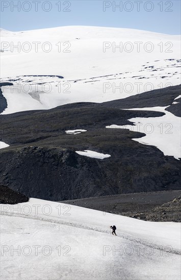 Hiker on snow field