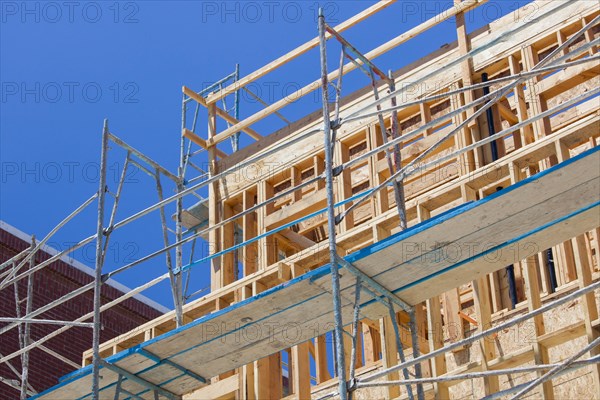 Scaffolding and wood framing at construction site