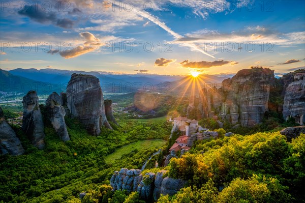 Sunset over monastery of Rousanou and Monastery of St