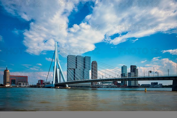 View of Rotterdam cityscape with Erasmusbrug bridge over Nieuwe Maas and modern architecture skyscrapers