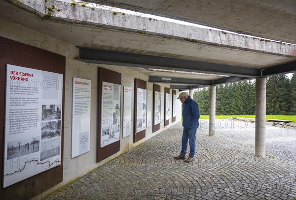Hikers in front of the information boards of the Iron Curtain Memorial at the Guglwald border crossing