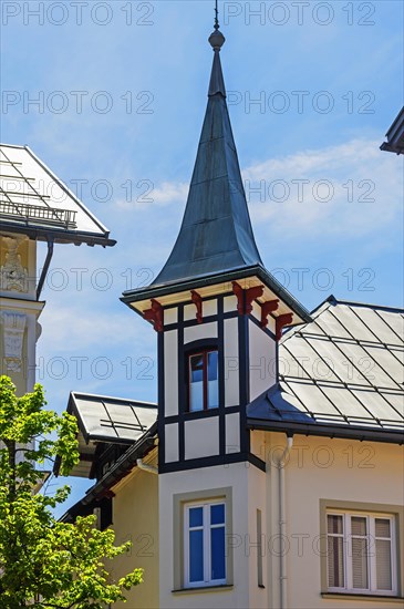 House with turret and dormer windows