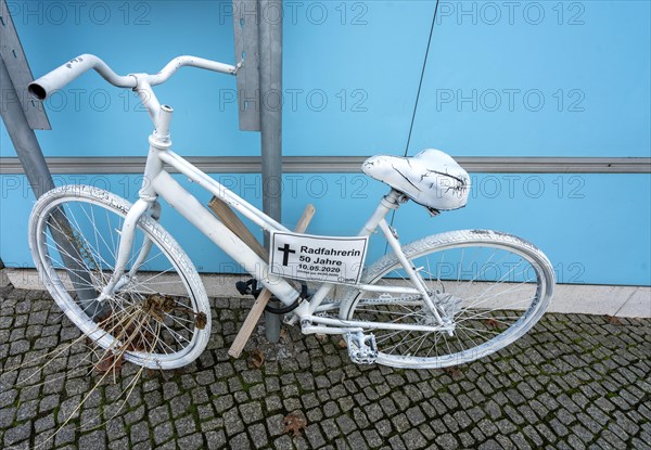 White bicycle serves as a reminder for road traffic victims