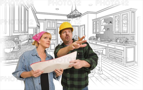 Contractor talking with customer over custom kitchen drawing