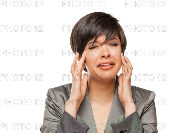 Grimacing biracial girl holding her head with her hands isolated against white background