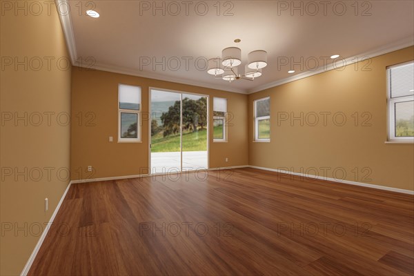 Newly remodeled room of house with finished wood floors