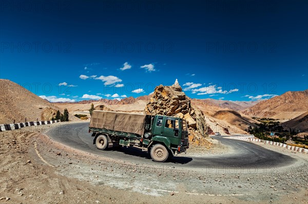 Indian army lorry truck car on national highway Srinagar-Leh NH-1 in Himalayas