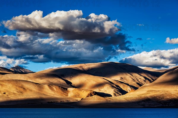 Himalayas and Himalayan mountain lake Tso Moriri on sunset. Korzok