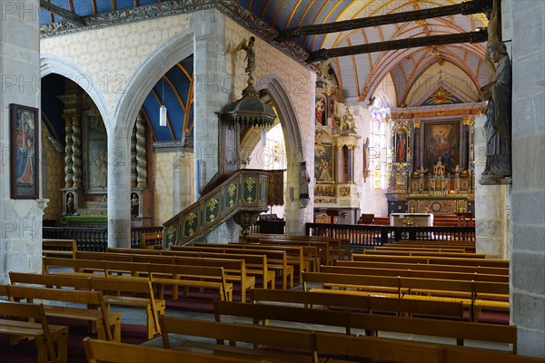 Nave of the church with pulpit and altar