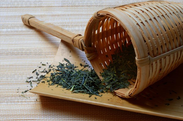 tea in bamboo strainer