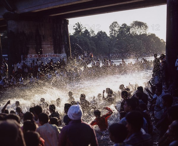 Boat racers apporoaching finishing point at Payipad Boat Racing near Haripad during onam festival