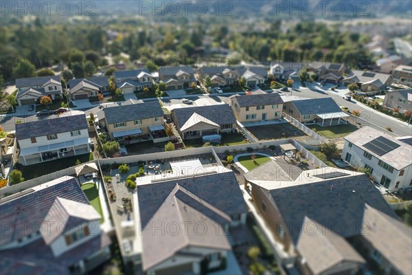 Aerial view of populated neigborhood of houses with tilt-shift blur