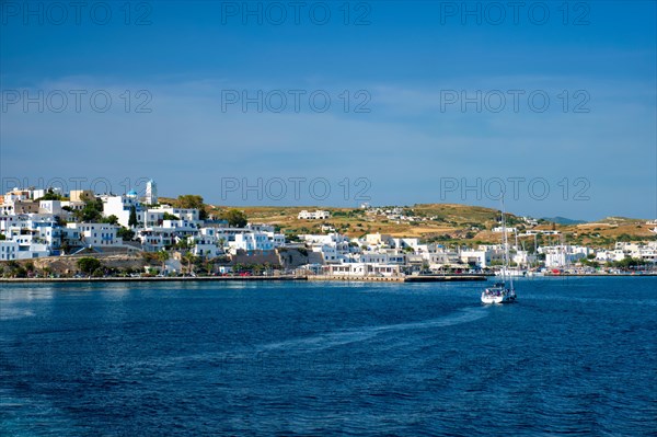 Yacht boat in Aegean sea near Adamantas Adamas harbor town of Milos island. Milos
