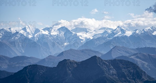 Snow-covered mountain peaks on the main ridge of the Alps