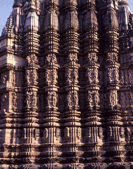 Sculpture on the exterior of the Duladeo temple walls in Khajuraho