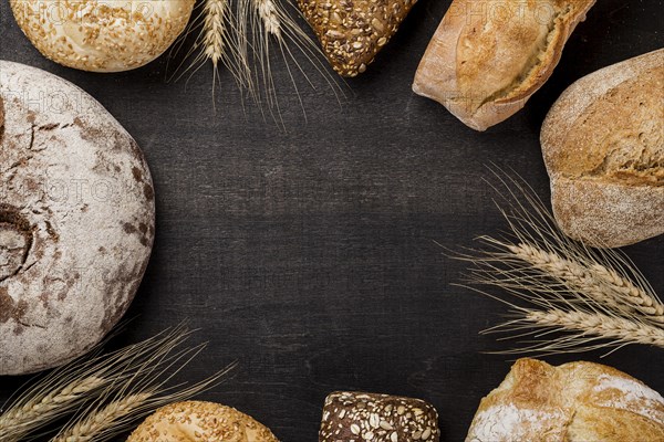 Assortment of baked bread with copy space