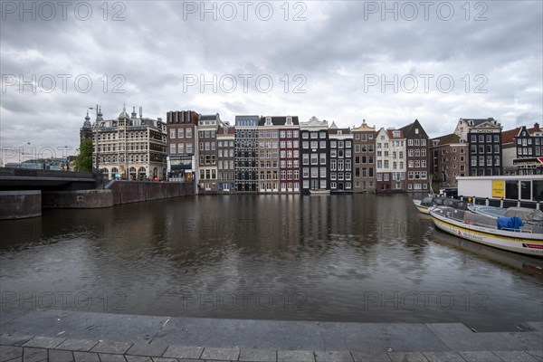 Characteristic houses on the Damrak Canal