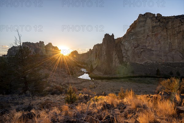 Sun star on rock walls