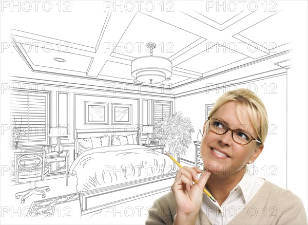 Daydreaming woman with pencil over beautiful custom bedroom drawing thought bubble