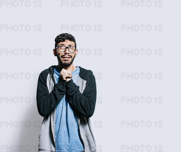 Person pleading with hands together isolated. distressed man asking for a favor