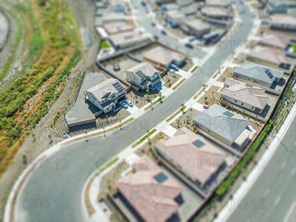 Aerial view of populated neigborhood of houses with tilt-shift blur