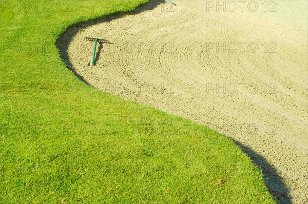 Abstract of golf course and sand bunker