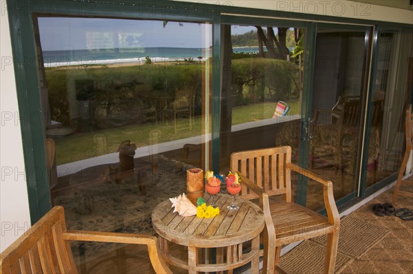 Oceanfront lanai with reflection of view