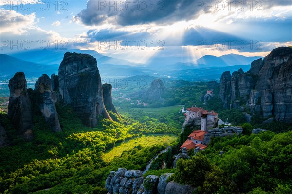 Sunset over monastery of Rousanou and Monastery of St