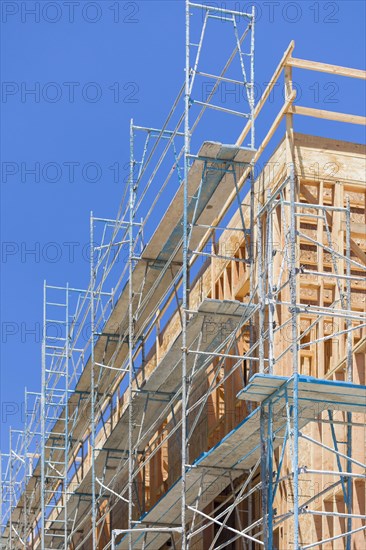 Scaffolding and wood framing at construction site