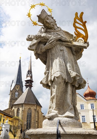 Nepomuk statue on the main square with town parish church